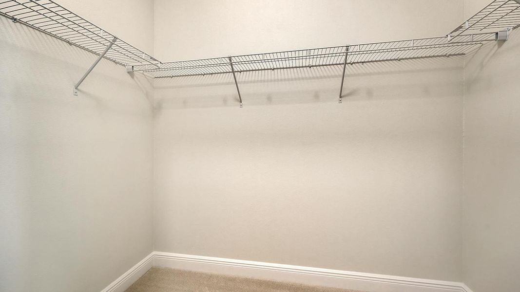 Spacious, unfurnished interior of a new home in Wildleaf Real Estate and Homes for Sale in Parrish, FL - Neal Communities, Parrish (Image 25).