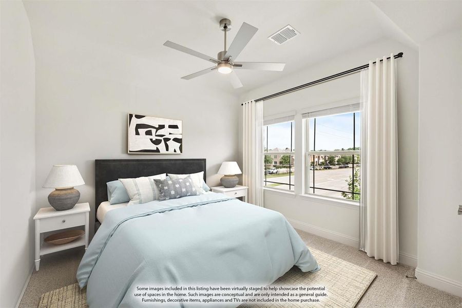 Bedroom with ceiling fan, vaulted ceiling, large windows, and carpet flooring