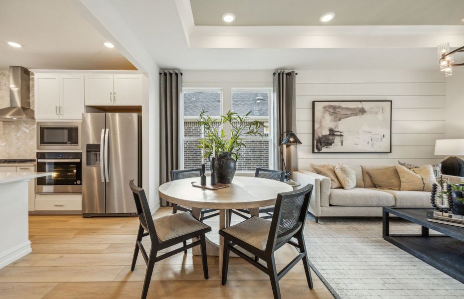 Dining area with view of kitchen and gathering room