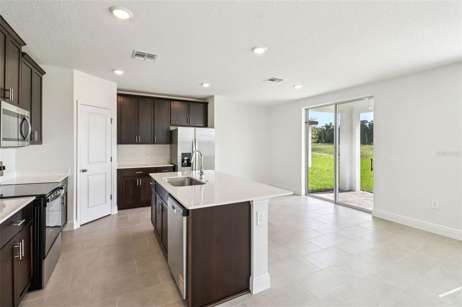 Furnished interior view inside a new home in The Reserve at Hammock Oaks - Classic Series, Lady Lake (Image 12).