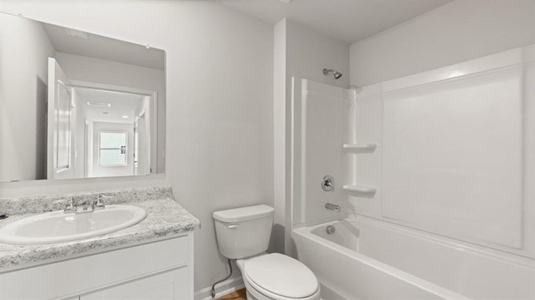 Furnished interior view inside a new home in Oaks at Cedar Grove, Fairburn (Image 7).