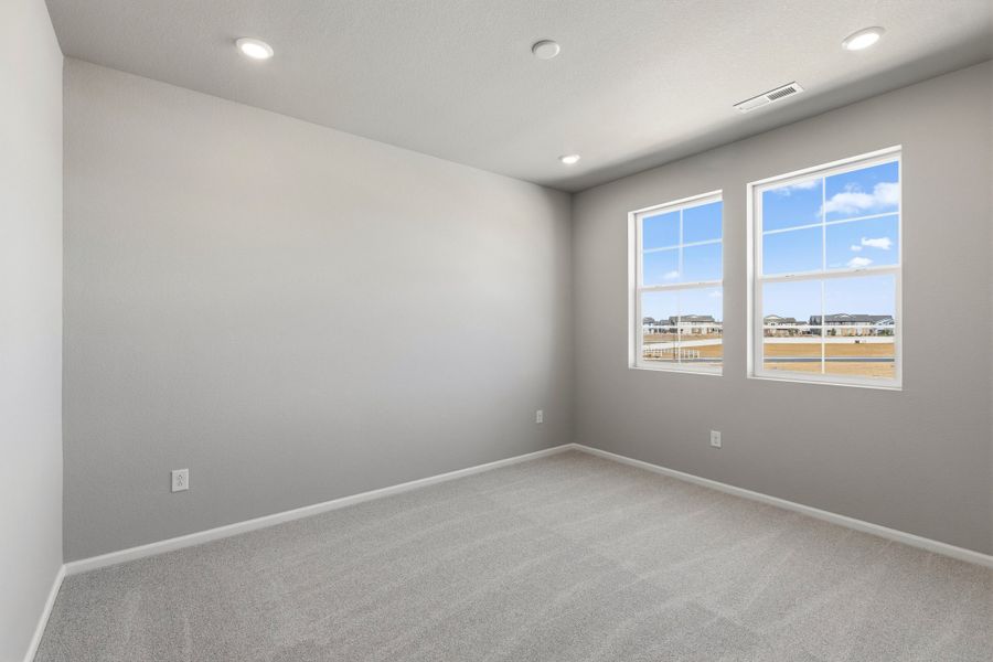 Spacious, unfurnished interior of a new home in The Estates Collection at Murphy Creek, Aurora (Image 21).
