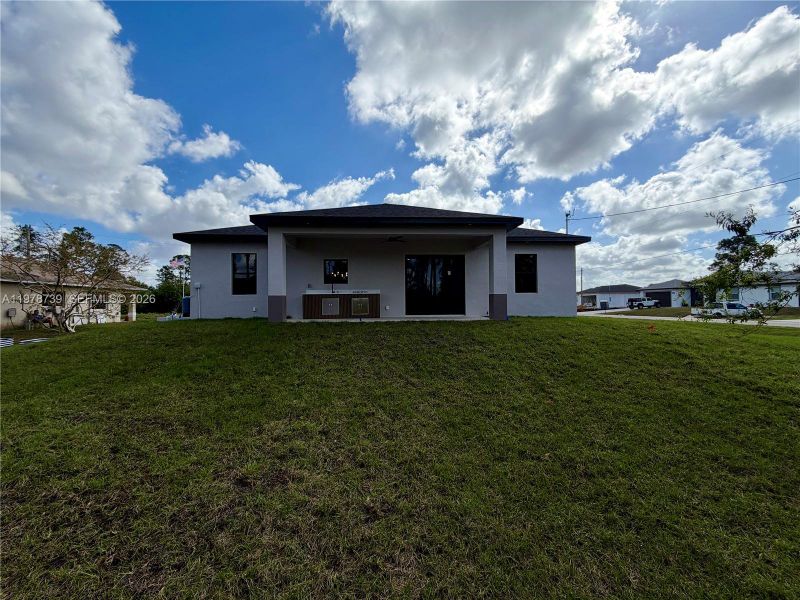 Exterior details and patio area of a home in , Lehigh Acres (Image 34).