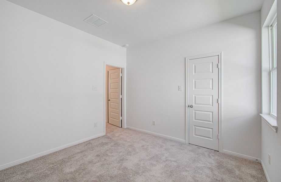 Spacious, unfurnished interior of a new home in Harmony Cove, Humble (Image 37).