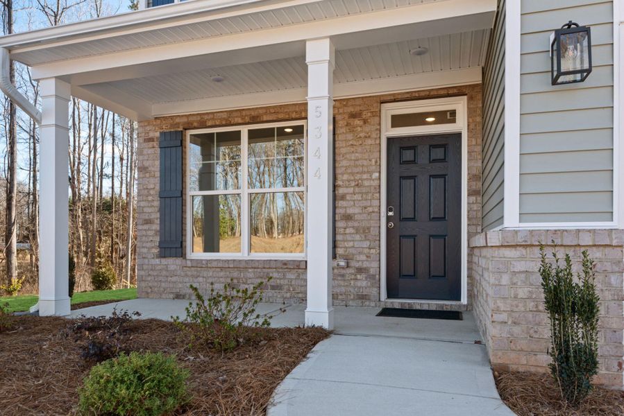 Exterior details and patio area of a home in Chandler Ridge, McLeansville (Image 3).