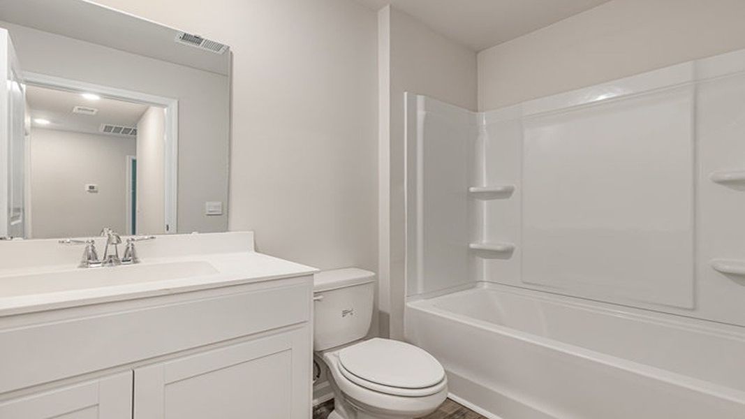 Furnished interior view inside a new home in Southshore Bay, Sunset Beach (Image 17).