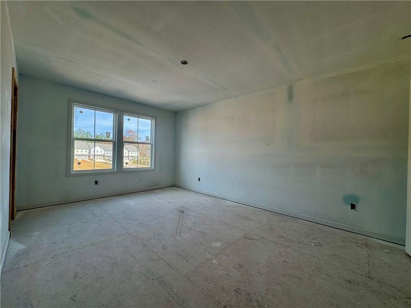 In-progress construction of a new home in Eastlyn Crossing - Single Family, Flowery Branch, GA (Image 19).