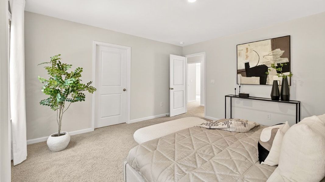 Representative furnished interior of a home built from the OLIVER by D.R. Horton in Barwell Park, Raleigh (Image 13).