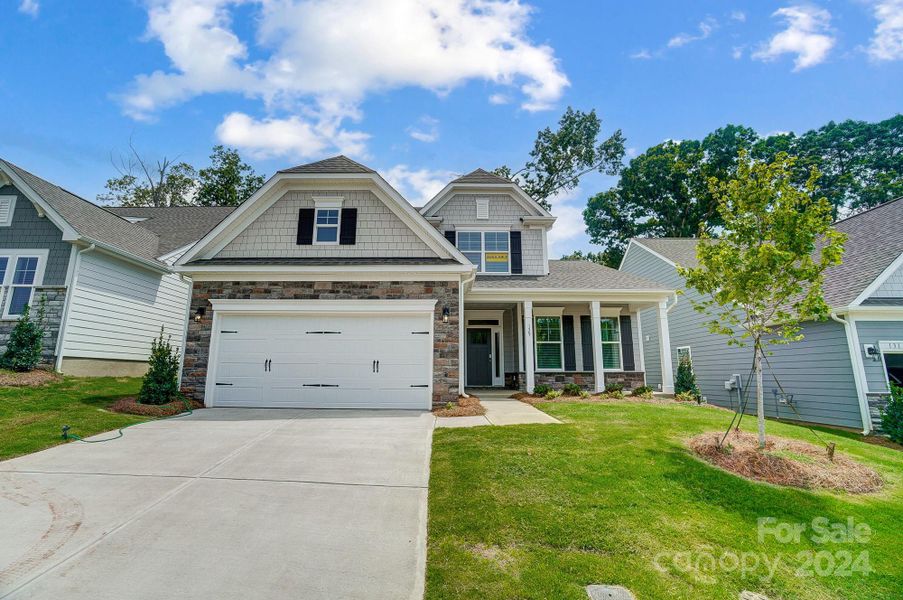 Homesite 75 features a Raleigh D floorplan with front-load garage.