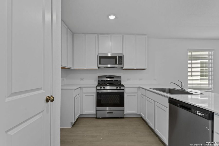 Furnished interior view inside a new home in Torian Village, San Antonio (Image 8).