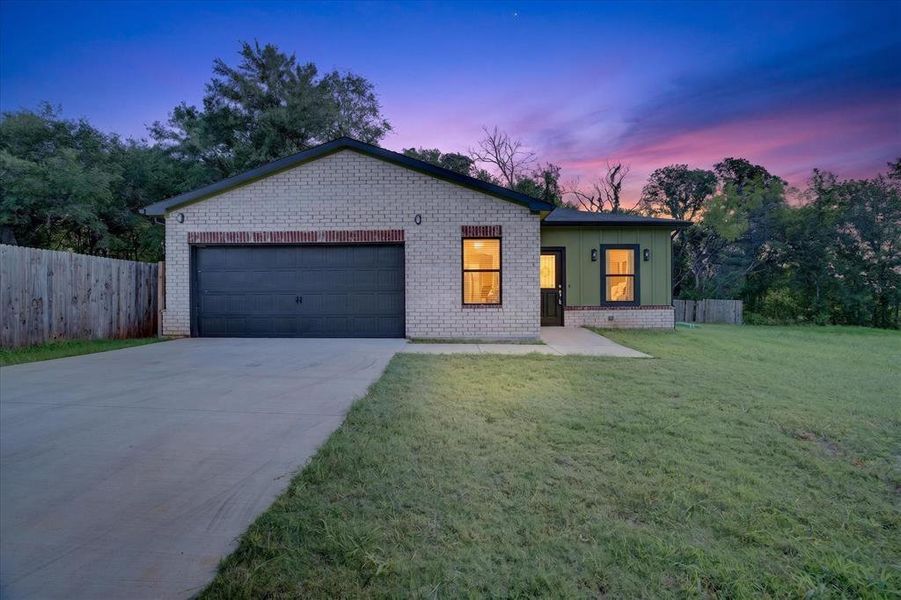 Front exterior of a new home in , Granbury, TX, highlighting curb appeal (Image 26).