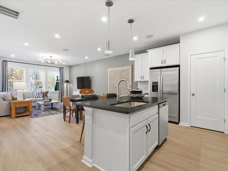 Representative furnished interior of a home built from the Avett by Tri Pointe Homes in Ellis Townes, Charlotte (Image 16).