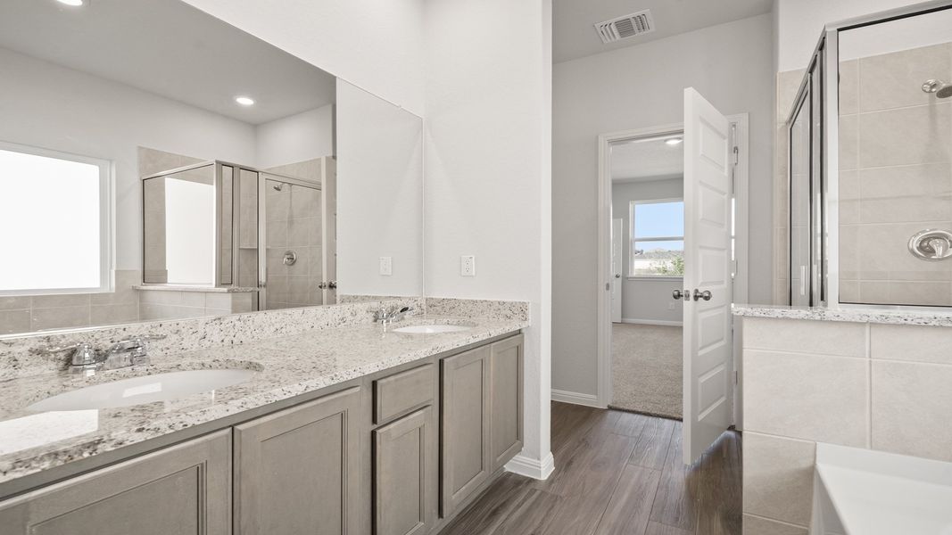Furnished interior view inside a new home in Hunters Ranch, San Antonio (Image 8).