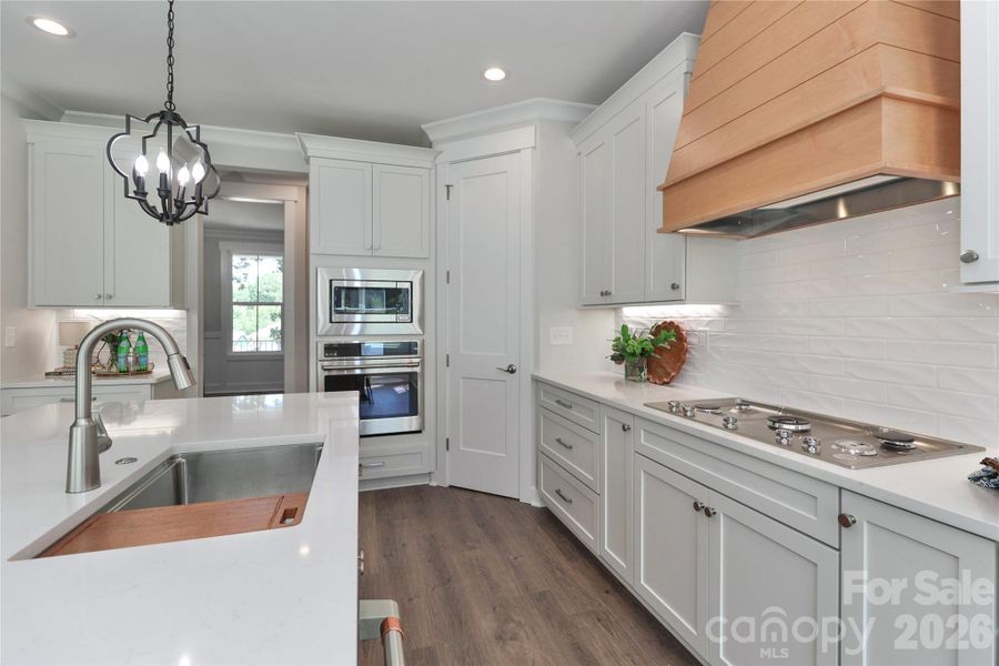 A thoughtfully designed kitchen with ample prep space. A thoughtfully designed kitchen with ample prep space.