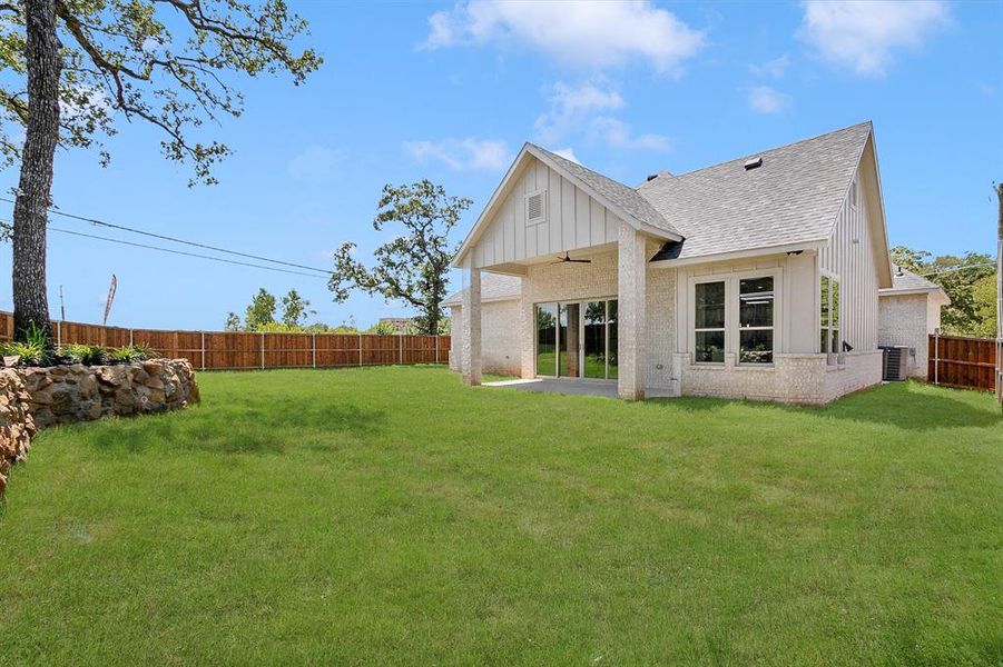 Front exterior of a new home in , Arlington, TX, highlighting curb appeal (Image 25).