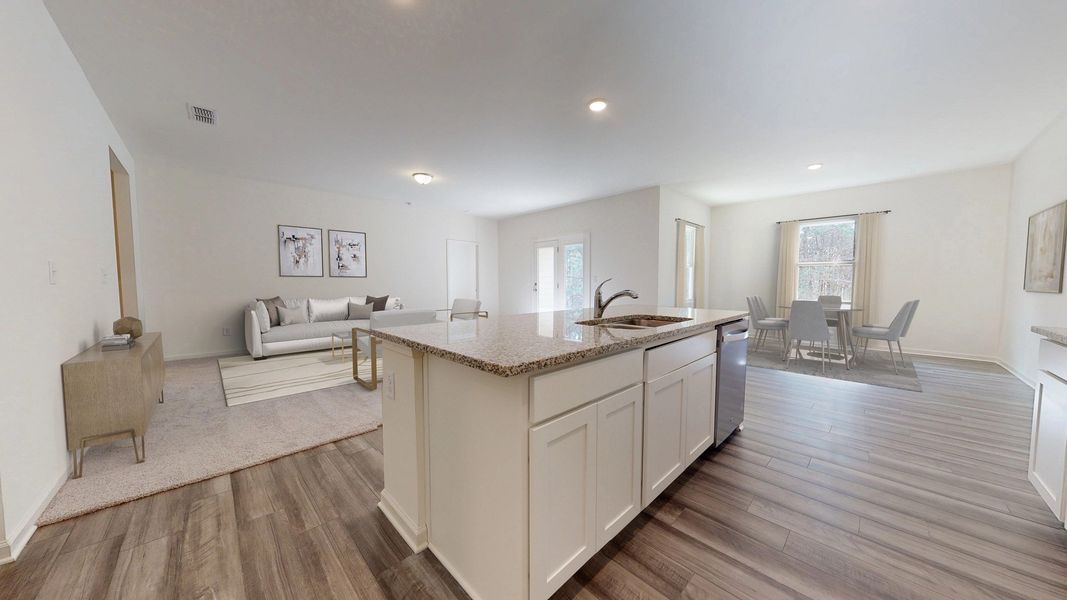 Representative furnished interior of a home built from the Vega by Starlight Homes in Oakfield Lakes, Parrish (Image 3).