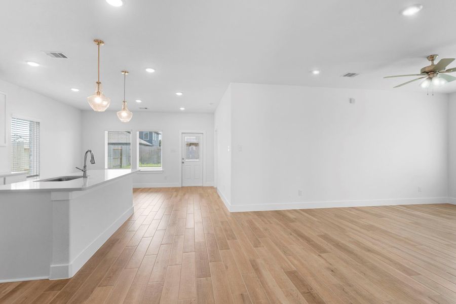 Open-concept layout connecting the gourmet kitchen, casual dining, and living areas—ideal for everyday living and entertaining.  Simply stunning!
