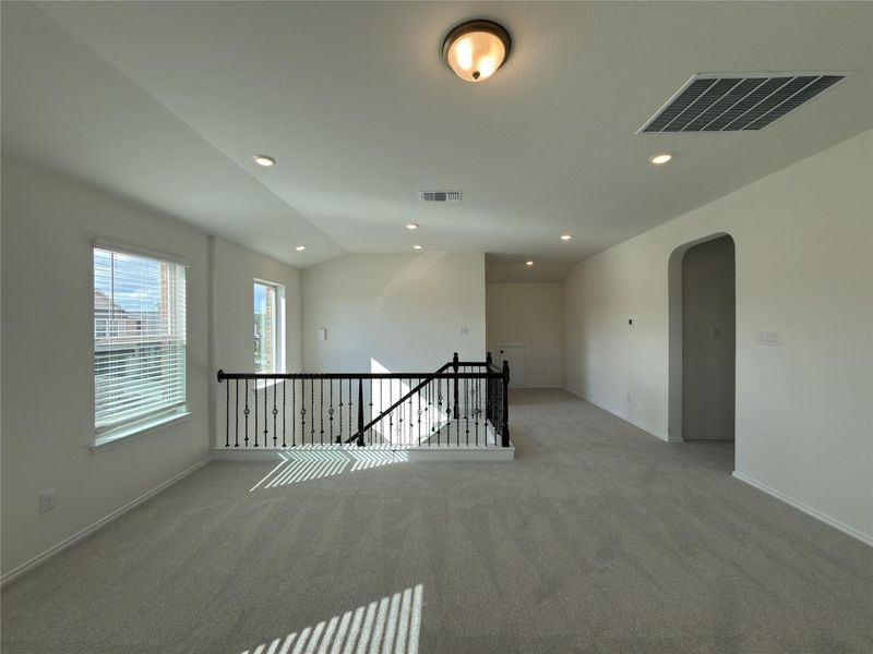 Spacious, unfurnished interior of a new home in River Bluff, Leander (Image 34).