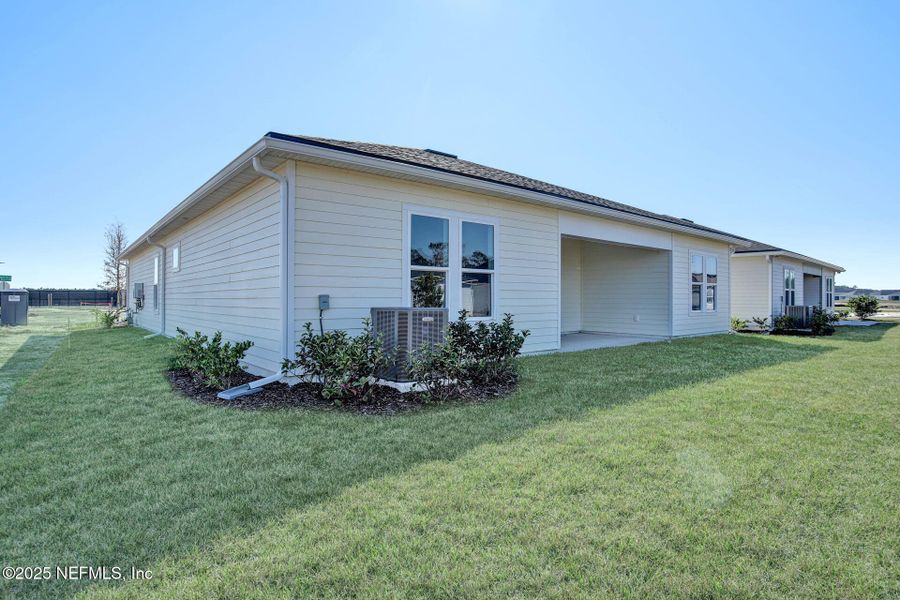 Exterior details and patio area of a home in Discover 55+ Living at Silverleaf, St. Augustine (Image 3).