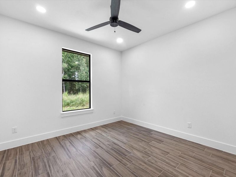 secondary bedrooms all feature a ceiling fan for extra comfort and custom closets.