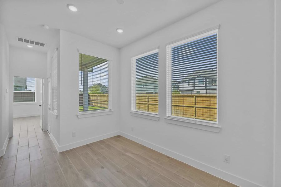 Representative unfurnished interior of a home built from the Versailles by Chesmar Homes in Meridiana Chateau, Manvel (Image 40).