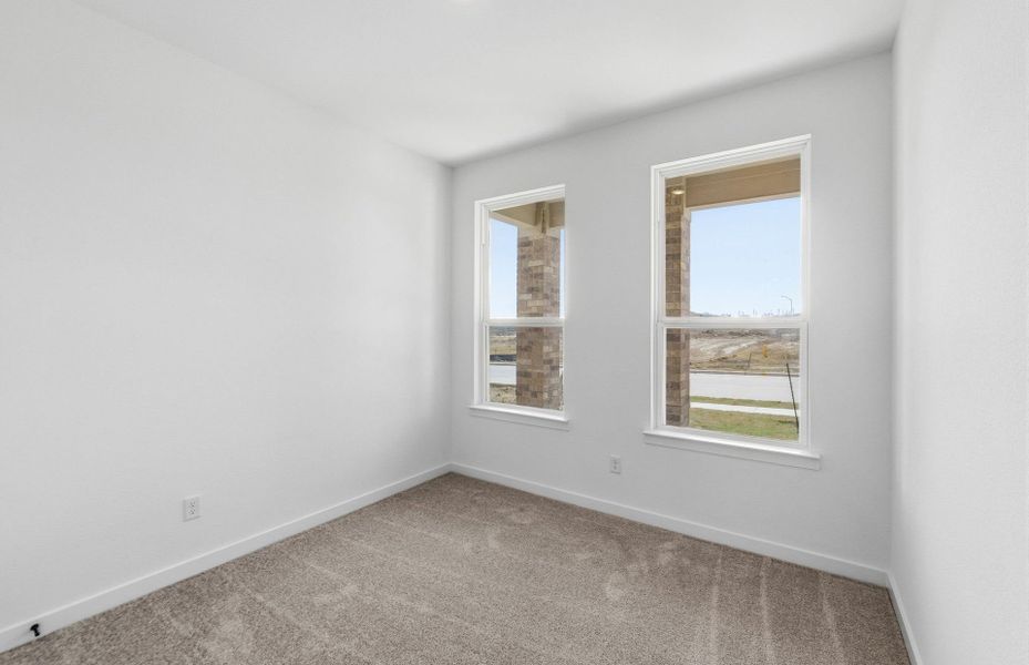 Spacious, unfurnished interior of a new home in Sunfield, Buda (Image 54).