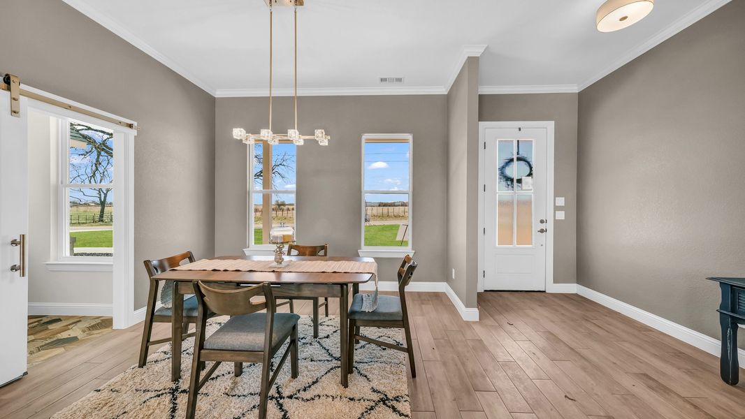 Representative furnished interior of a home built from the Clementine by Zeal Home Builders in Saddle Crest Estates, Weatherford (Image 32).