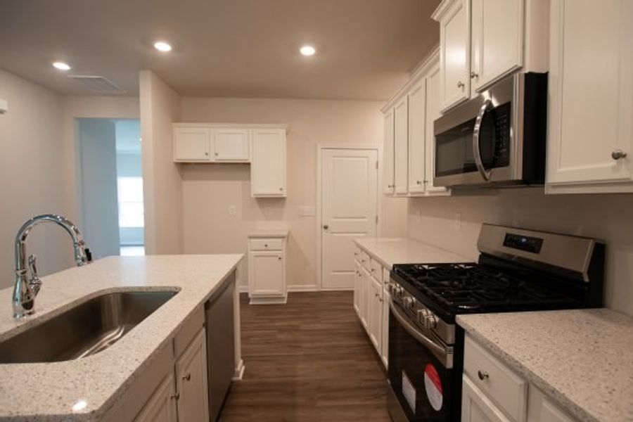 Representative furnished interior of a home built from the Waterford by Piedmont Residential in Villages at Cedar Hill, Dallas (Image 6).