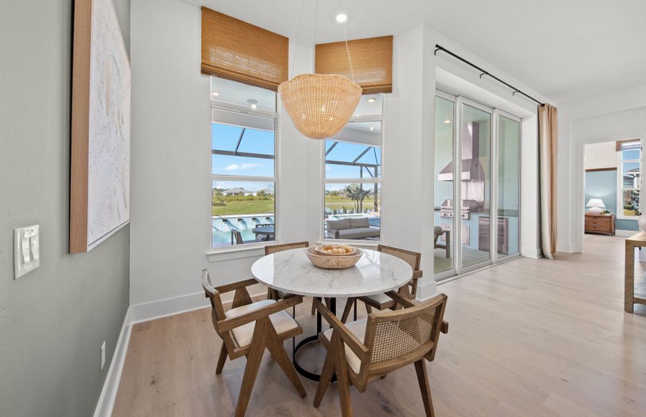 Representative furnished interior of a home built from the Layton Grande by DiVosta in BeachWalk by Manasota Key, Englewood (Image 31).