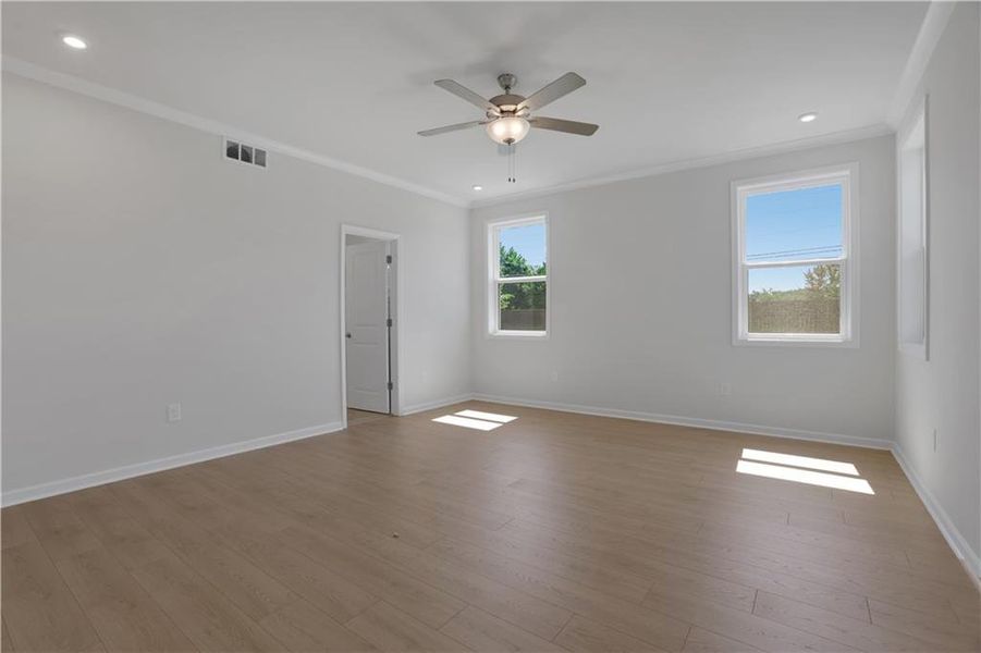 Spacious, unfurnished interior of a new home in The Paddocks at Doc Hughes, Buford (Image 39).