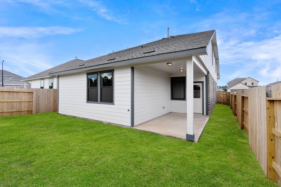 This backyard is perfect for family gatherings, social events, or simply unwinding in the fresh air.