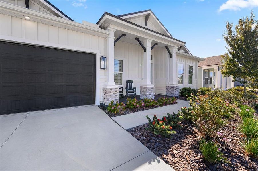 Front exterior of a new home in Oakmont, Gainesville, FL, highlighting curb appeal (Image 26).