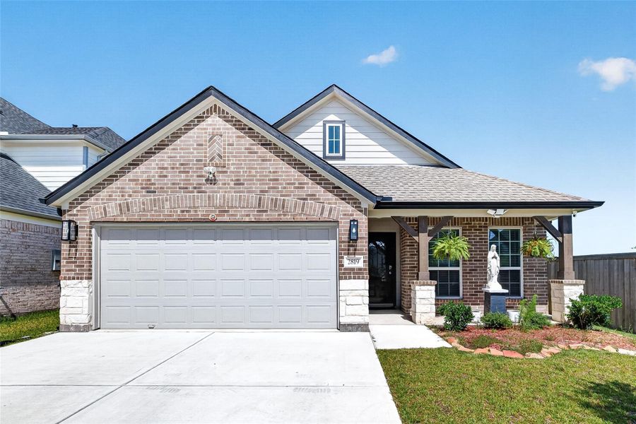 Front exterior of a new home in , Katy, TX, highlighting curb appeal (Image 1). Front exterior of a new home in , Katy, TX, highlighting curb appeal (Image 1).