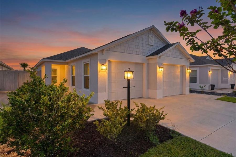 Front exterior of a new home in , The Villages, FL, highlighting curb appeal (Image 2). Front exterior of a new home in , The Villages, FL, highlighting curb appeal (Image 2).