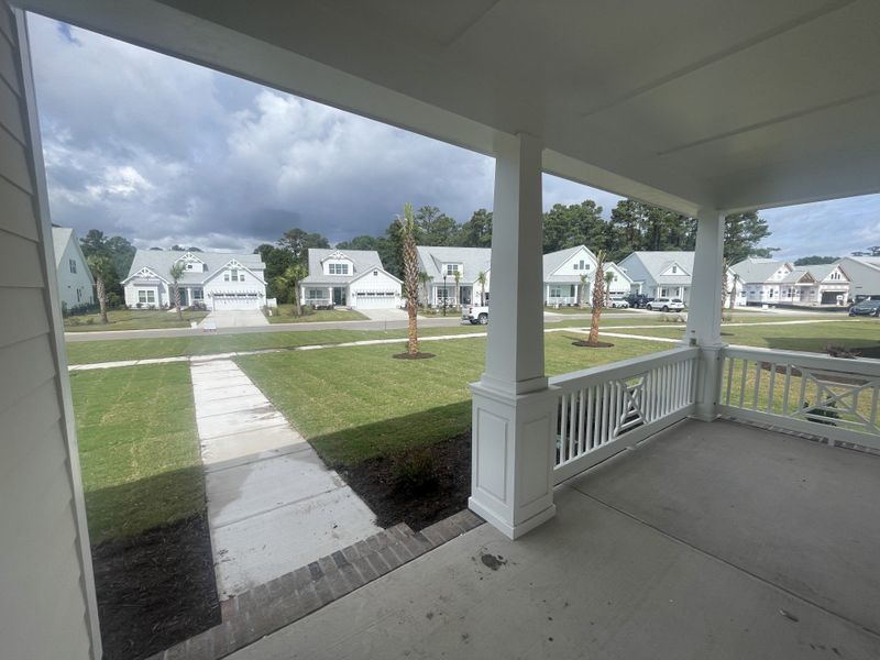 Exterior details and patio area of a home in The Sanctuary at Sunset Beach, Sunset Beach (Image 1).