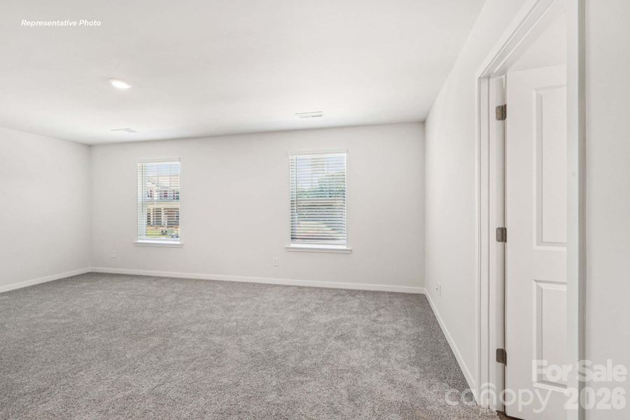 Spacious, unfurnished interior of a new home in Reedy Creek Preserve, Charlotte (Image 22).