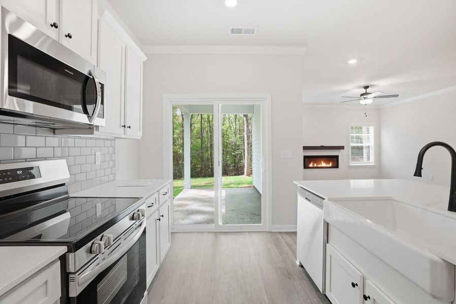 Representative furnished interior of a home built from the Magnolia Select M by McGuinn Homes in Broadway Lake, Anderson (Image 9).
