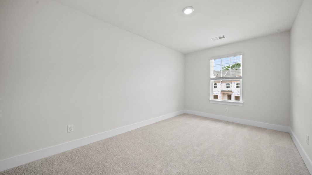 Vibrant and restful bedroom with oversized windows, refined detail, and a warm, welcoming atmosphere Vibrant and restful bedroom with oversized windows, refined detail, and a warm, welcoming atmosphere