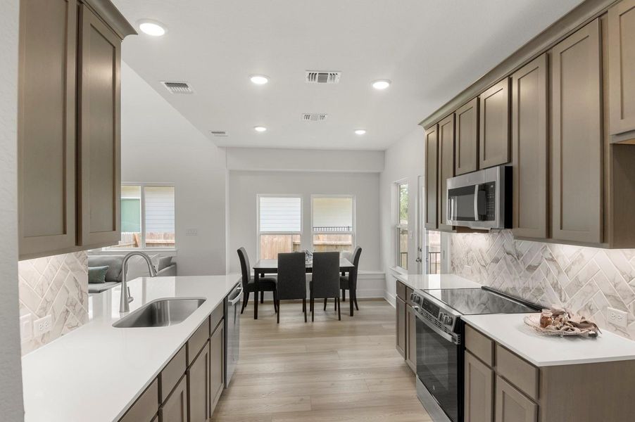 Furnished interior view inside a new home in Grande Estates, Bertram (Image 8). Furnished interior view inside a new home in Grande Estates, Bertram (Image 8).