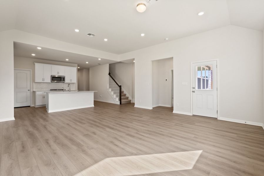 Representative unfurnished interior of a home built from the Somerville by Ashton Woods in Willow Springs, Buda (Image 30).