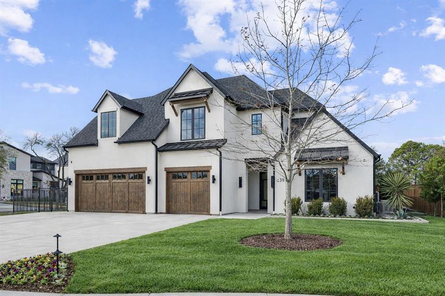 Front exterior of a new home in , Southlake, TX, highlighting curb appeal (Image 1). Front exterior of a new home in , Southlake, TX, highlighting curb appeal (Image 1).
