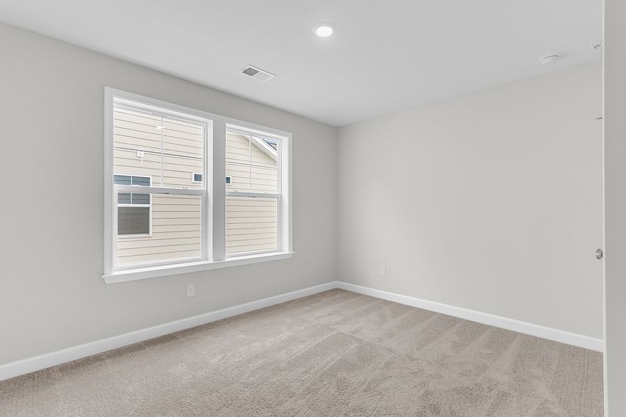 Spacious, unfurnished interior of a new home in Pineland Preserve, Summerville (Image 36).
