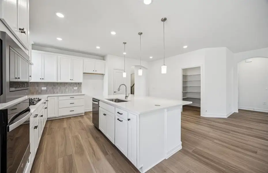 Airy kitchen with ample cabinet space Airy kitchen with ample cabinet space