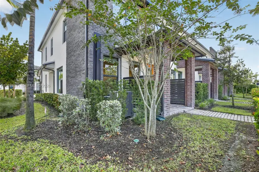 Exterior details and patio area of a home in , Plantation (Image 22).