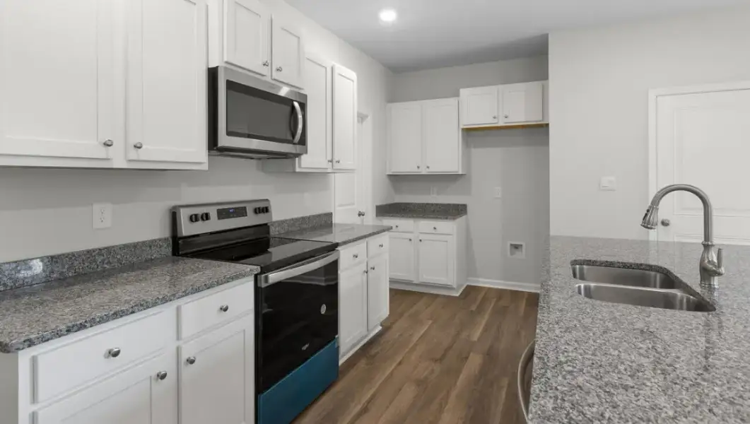Furnished interior view inside a new home in The Highlands at Cedar Hill Landing, Navassa (Image 6).