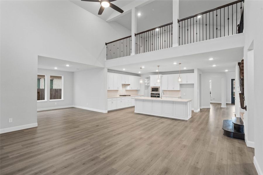 Whether you are relaxing in the great room or greeting guests at the front door, the open sightlines ensure that everyone feels connected, fostering a truly inclusive living experience where isolation is a thing of the past.