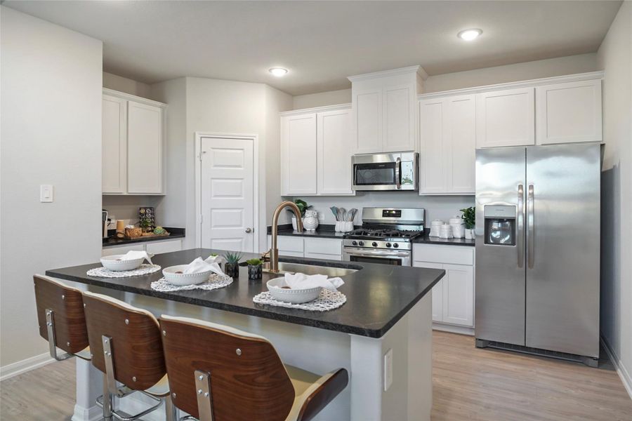 Furnished interior view inside a new home in Granger Pines, Conroe (Image 8).