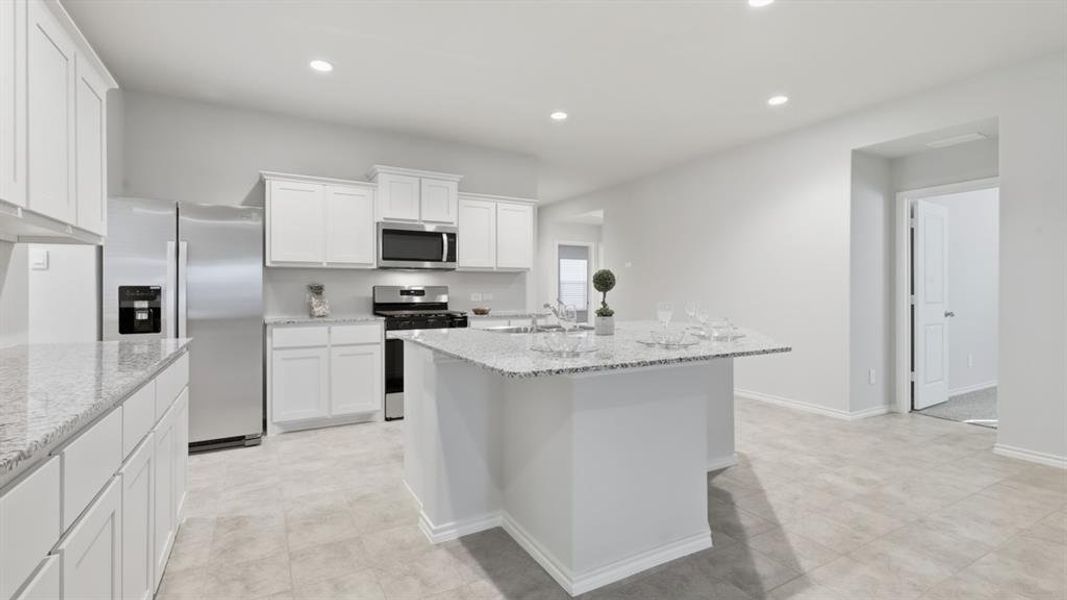 Kitchen - All Home and community information, including pricing, included features, terms, availability and amenities, are subject to change at any time without notice or obligation. All Drawings, pictures, photographs, video, square footages, floor plans, elevations, features, colors and sizes are approximate for illustration purposes only and will vary from the homes as built.