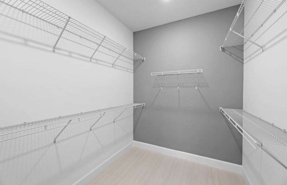 Spacious owner's walk-in closet