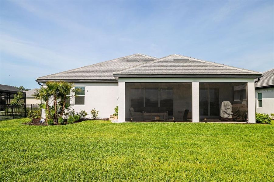 Exterior details and patio area of a home in Sweetwater at Lakewood Ranch, Bradenton (Image 31).